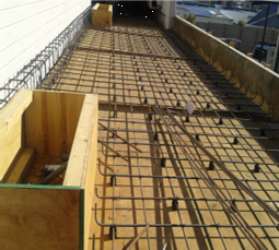Steel reinforcement laid over timber formwork